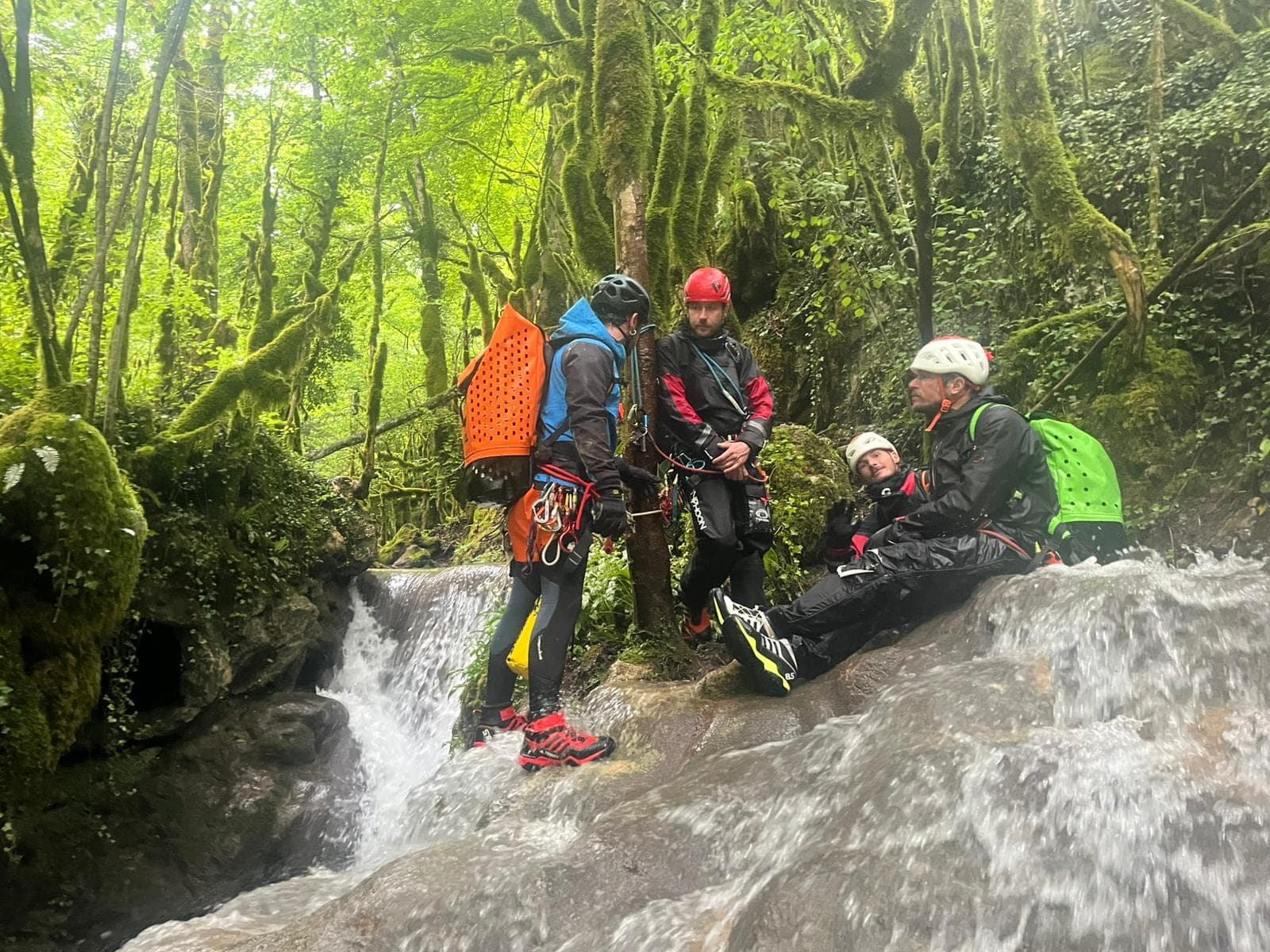 Group in a waterfall of the Clapouse canyon, Ubaye valley
